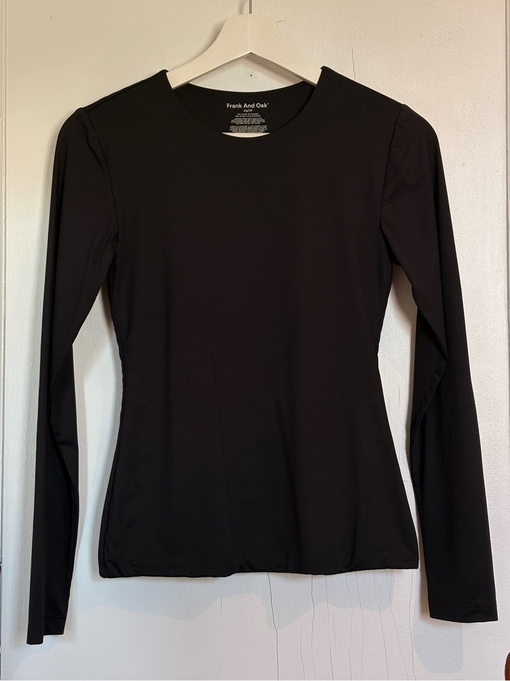 NWOT Women's Form-Fitting Black Long-Sleeve Crew Neck Top